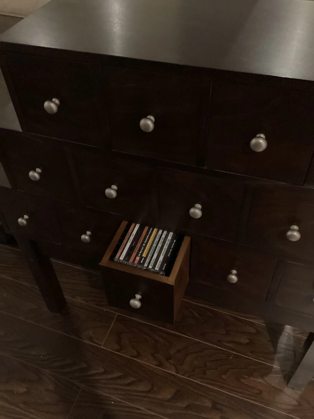 Dark Wood Dresser with Multiple Drawers