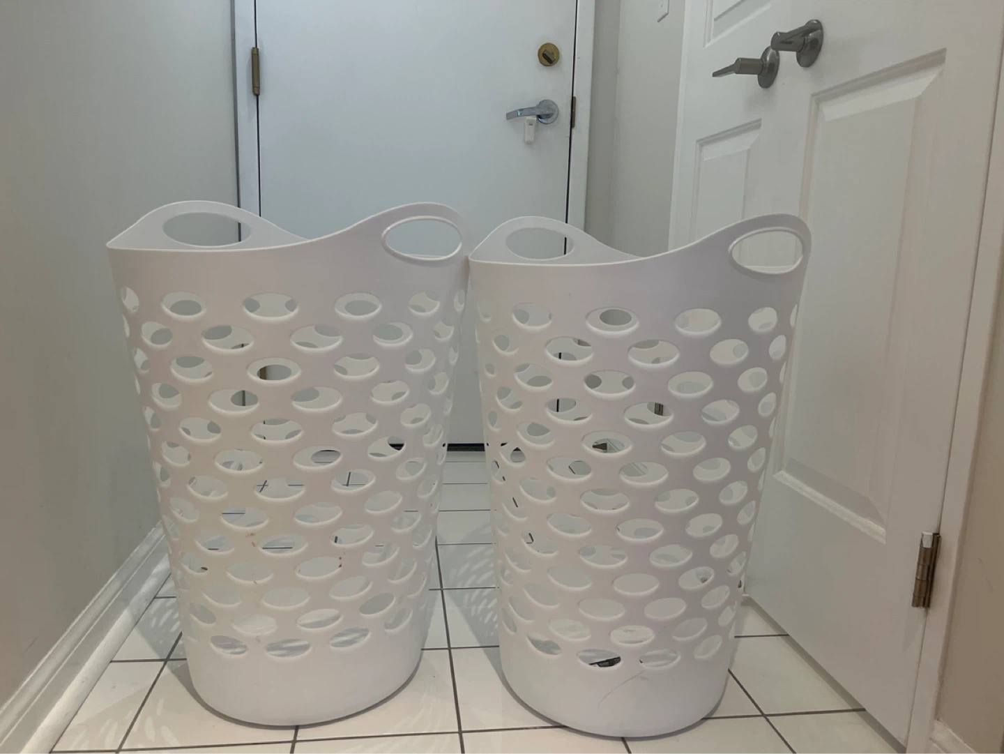 Pair of White Plastic Laundry Baskets