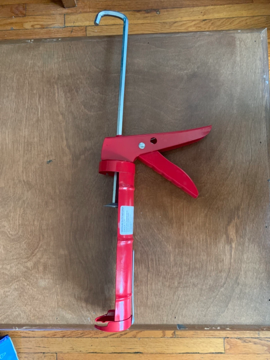 Red Caulk Gun