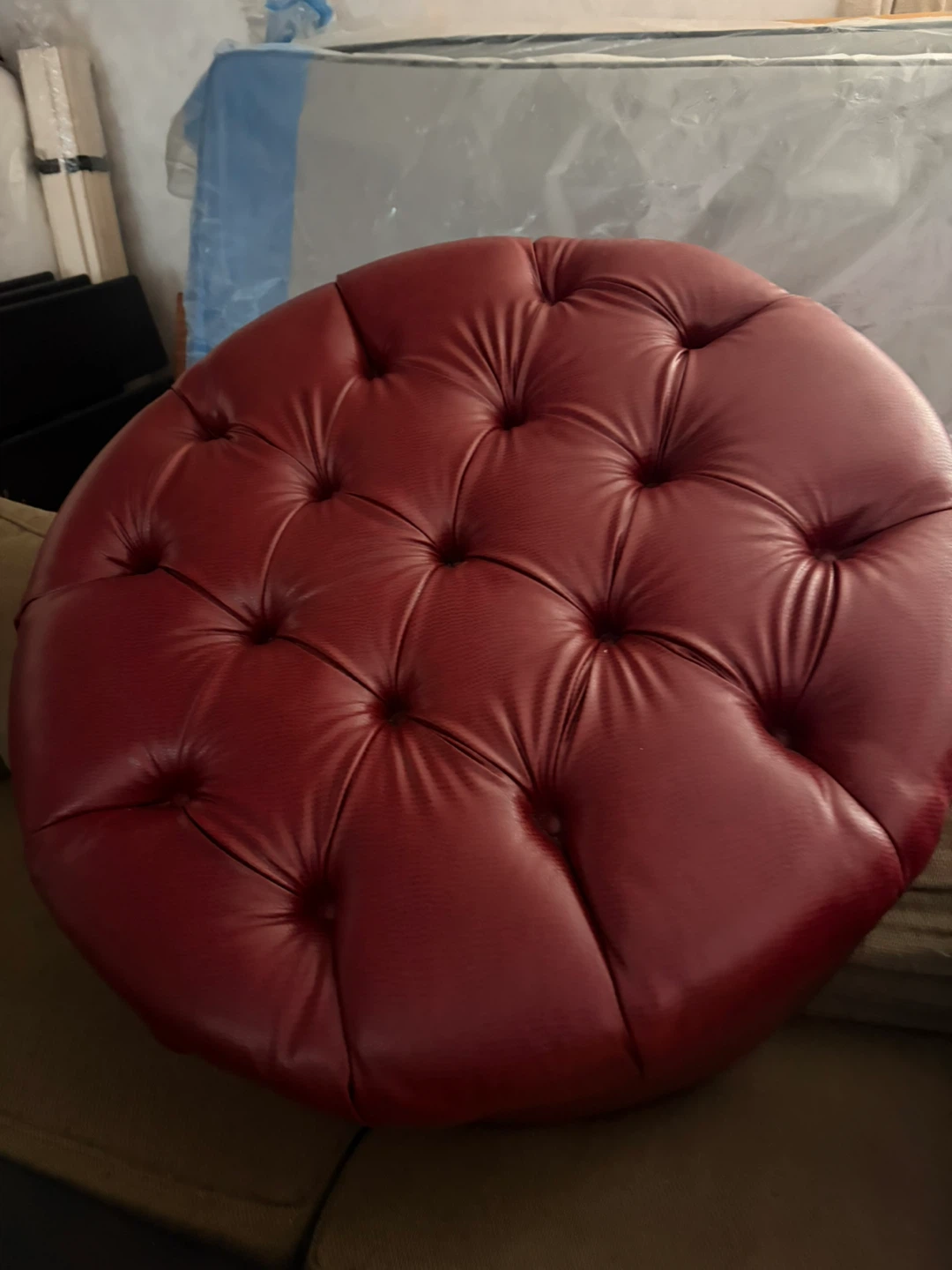 Red Tufted Round Ottoman with Wheels