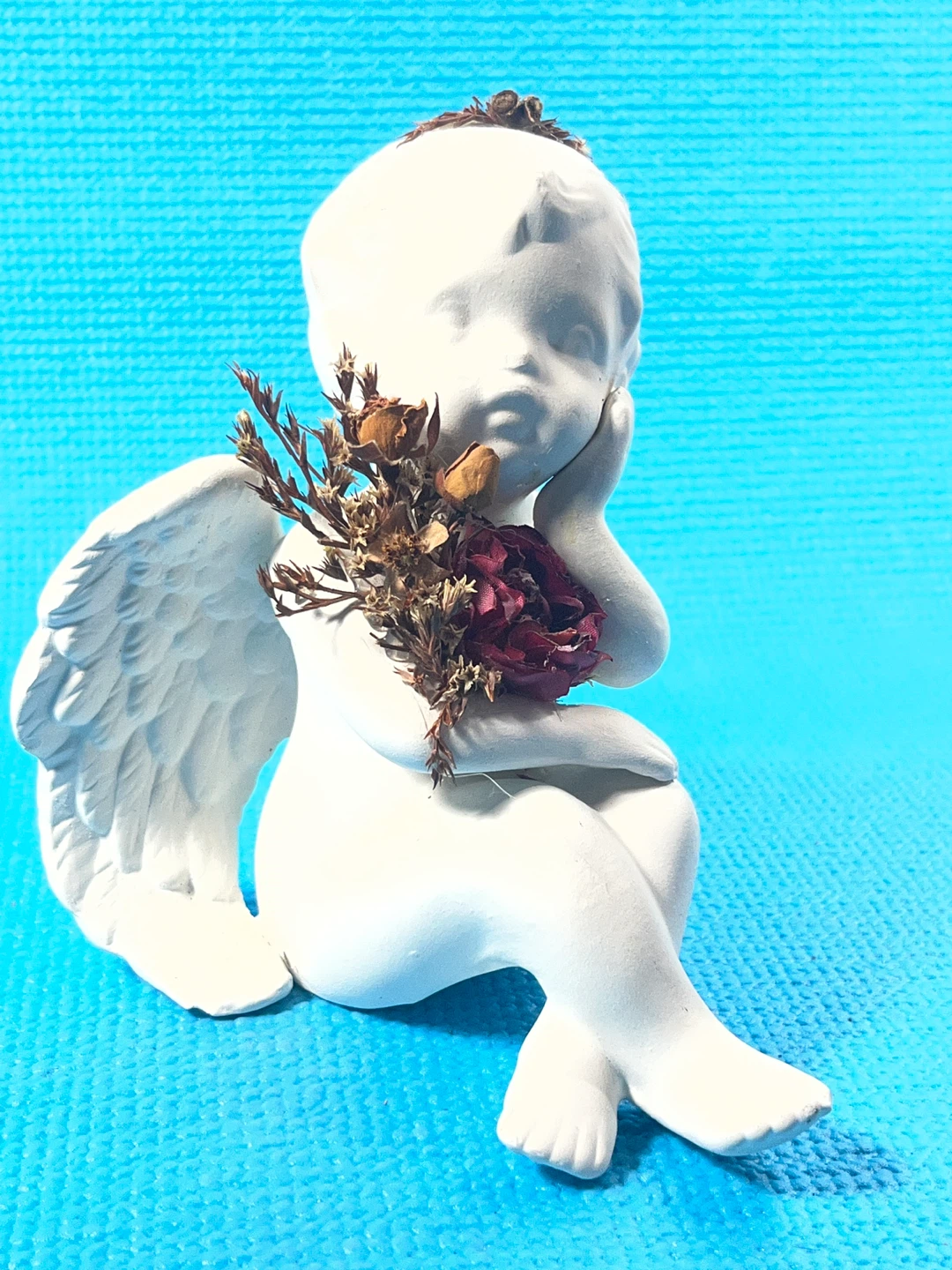 White Cherub Figurine with Dried Flowers