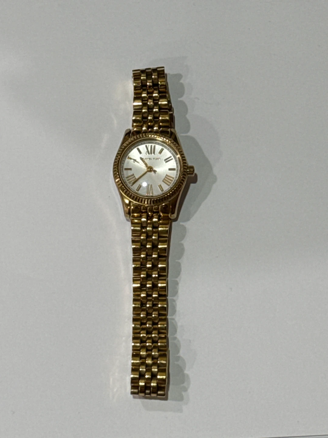 Michael Kor’s Gold Tone Ladies Watch
