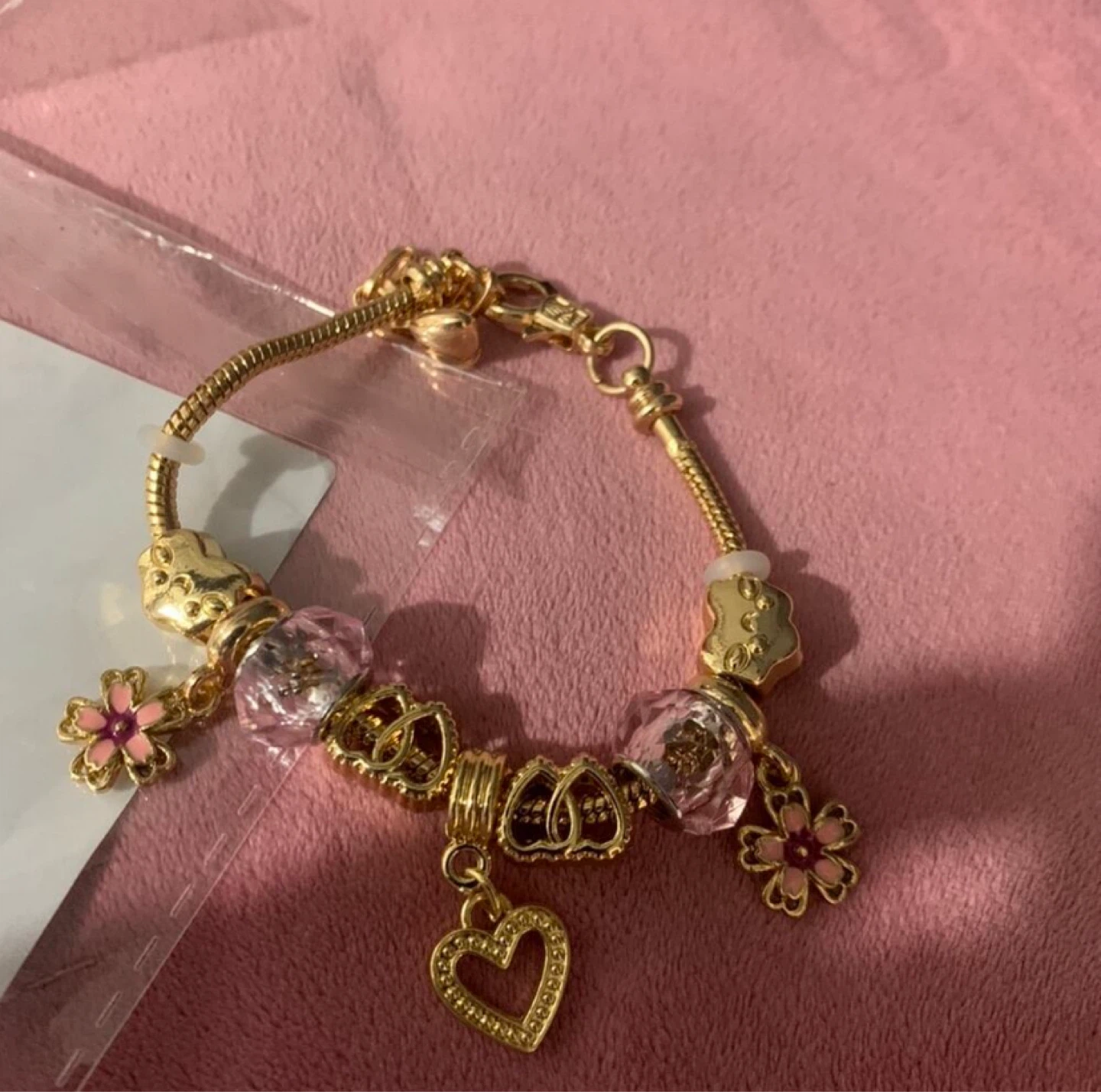 Gold Charm Bracelet with Pink Accents
