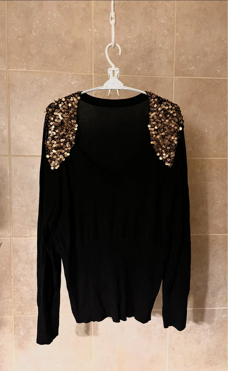 Black sweater with sequin collar