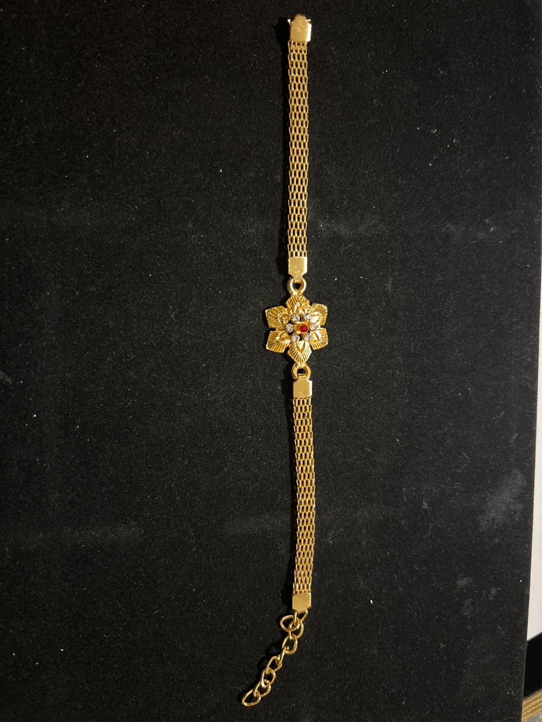 Gold Tone Bracelet with Flower Charm