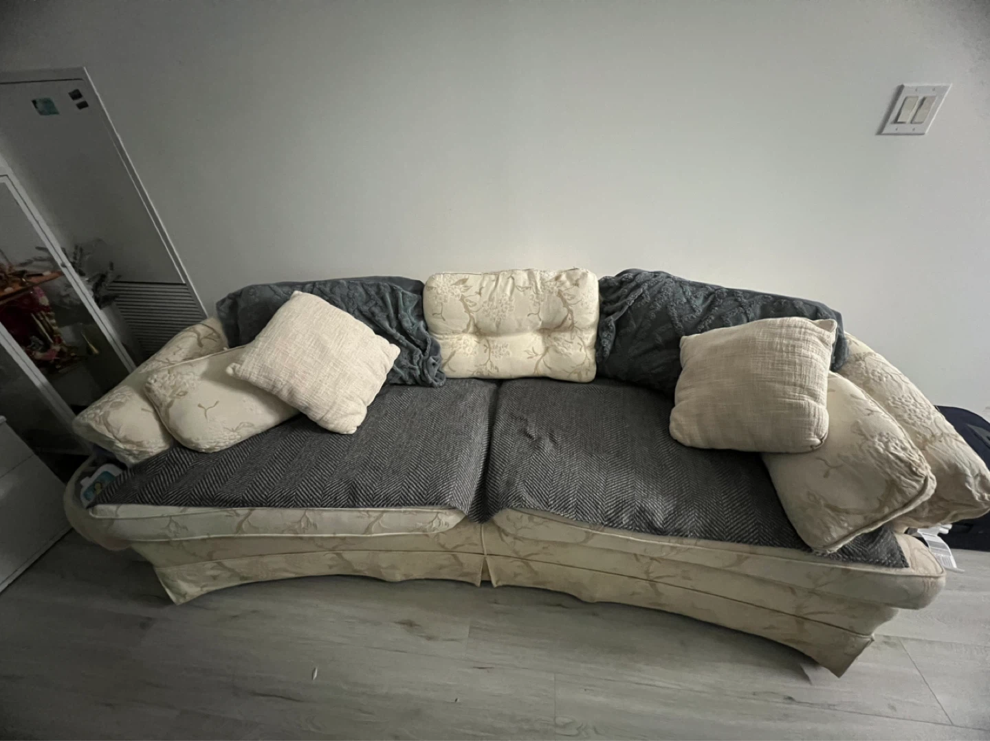 Cream and Grey Sofa with Decorative Pillows