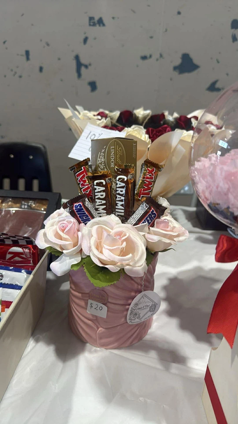 Assorted Chocolate & Rose Arrangement