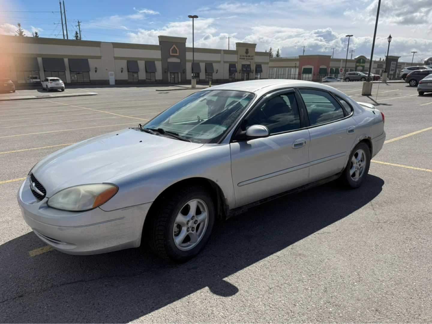 Silver Ford Taurus Sedan