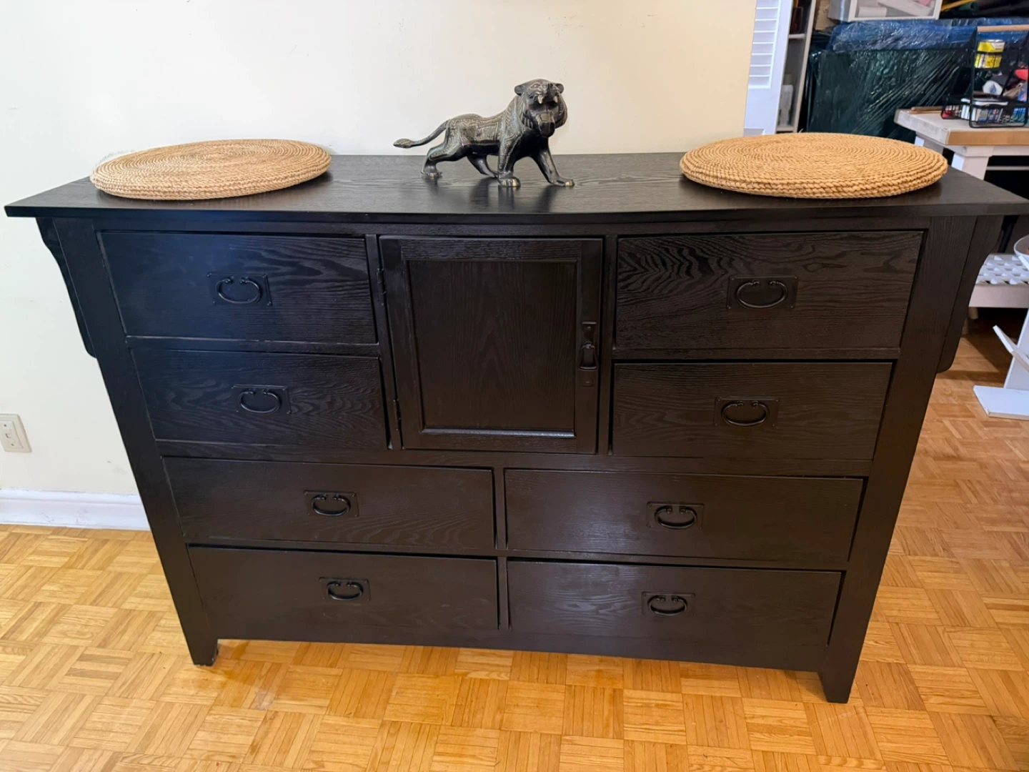 black wooden dresser with 9 drawers