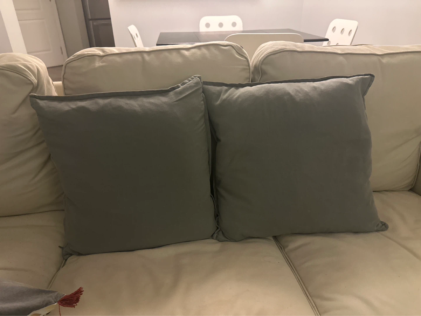 3 pillows (2 grey, 1 Decorative Throw Pillow with Tassels
