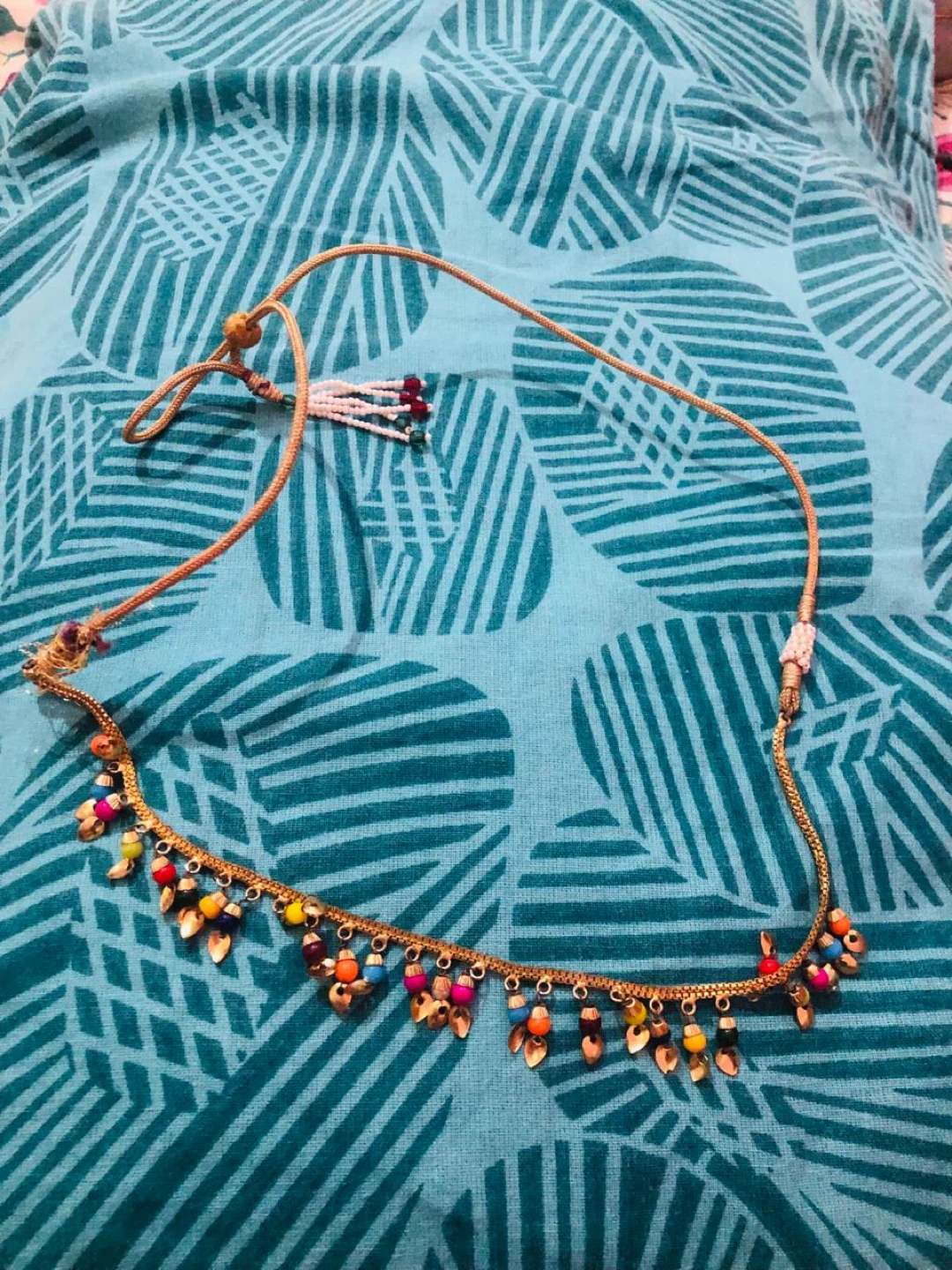 Gold-tone necklace with colourful beads