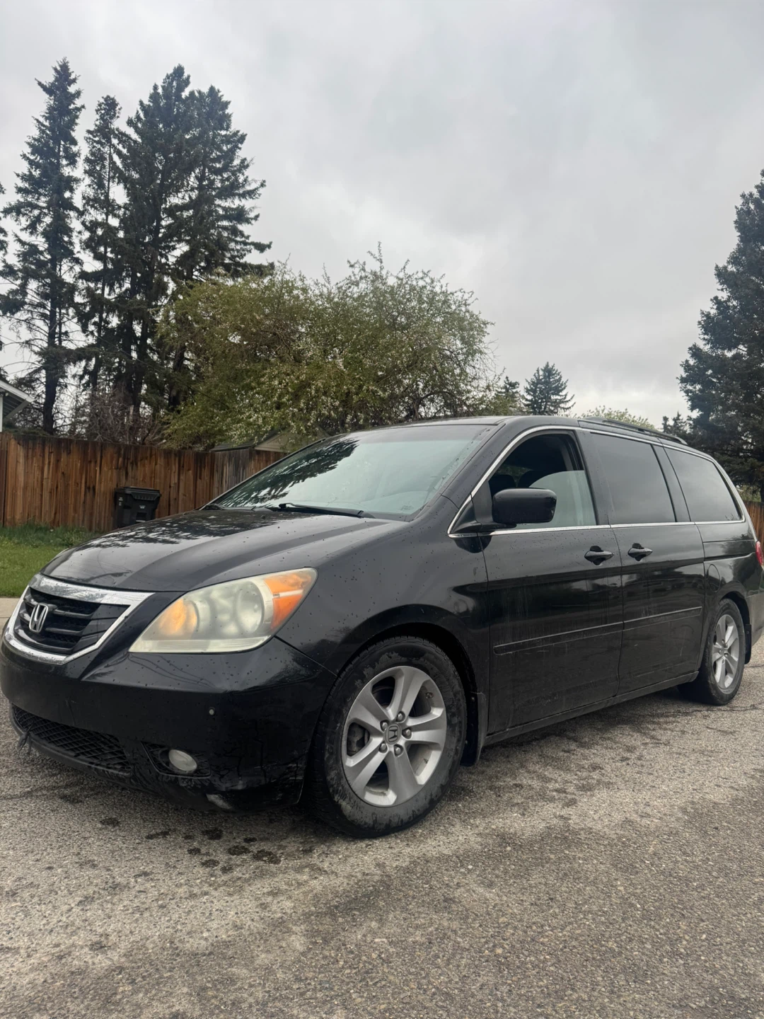 Black Honda Odyssey Minivan
