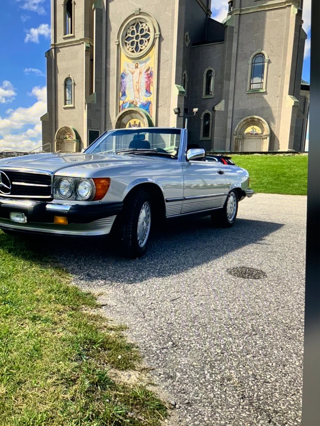 Silver Mercedes-Benz 560SL Convertible