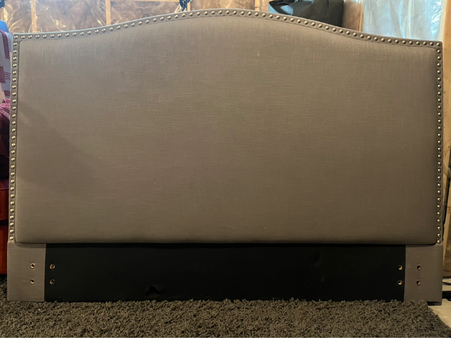 Grey Upholstered Headboard with Nailhead Trim