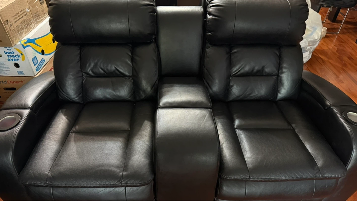 Black Leather Dual Recliner Loveseat with Cup Holders