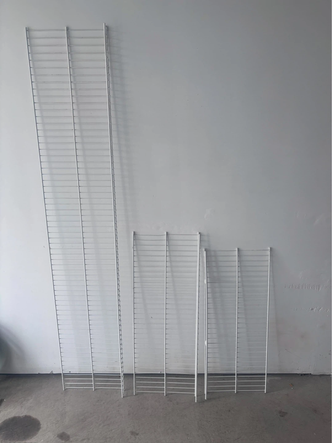 White wire shelving unit parts