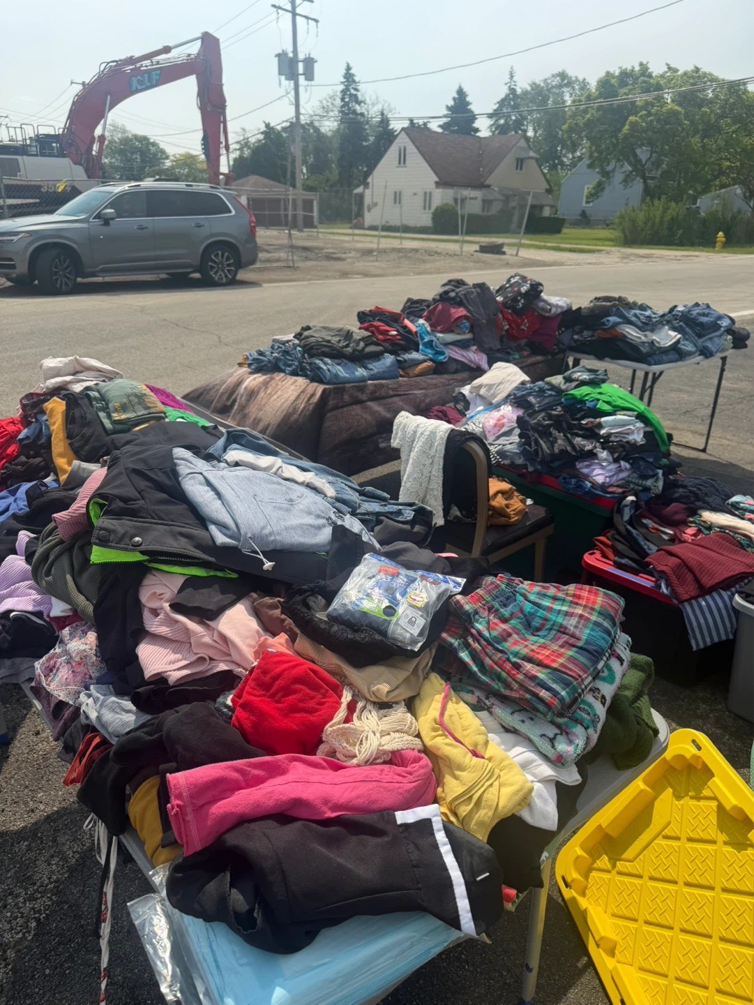 Assorted Clothing and Household Items Yard Sale