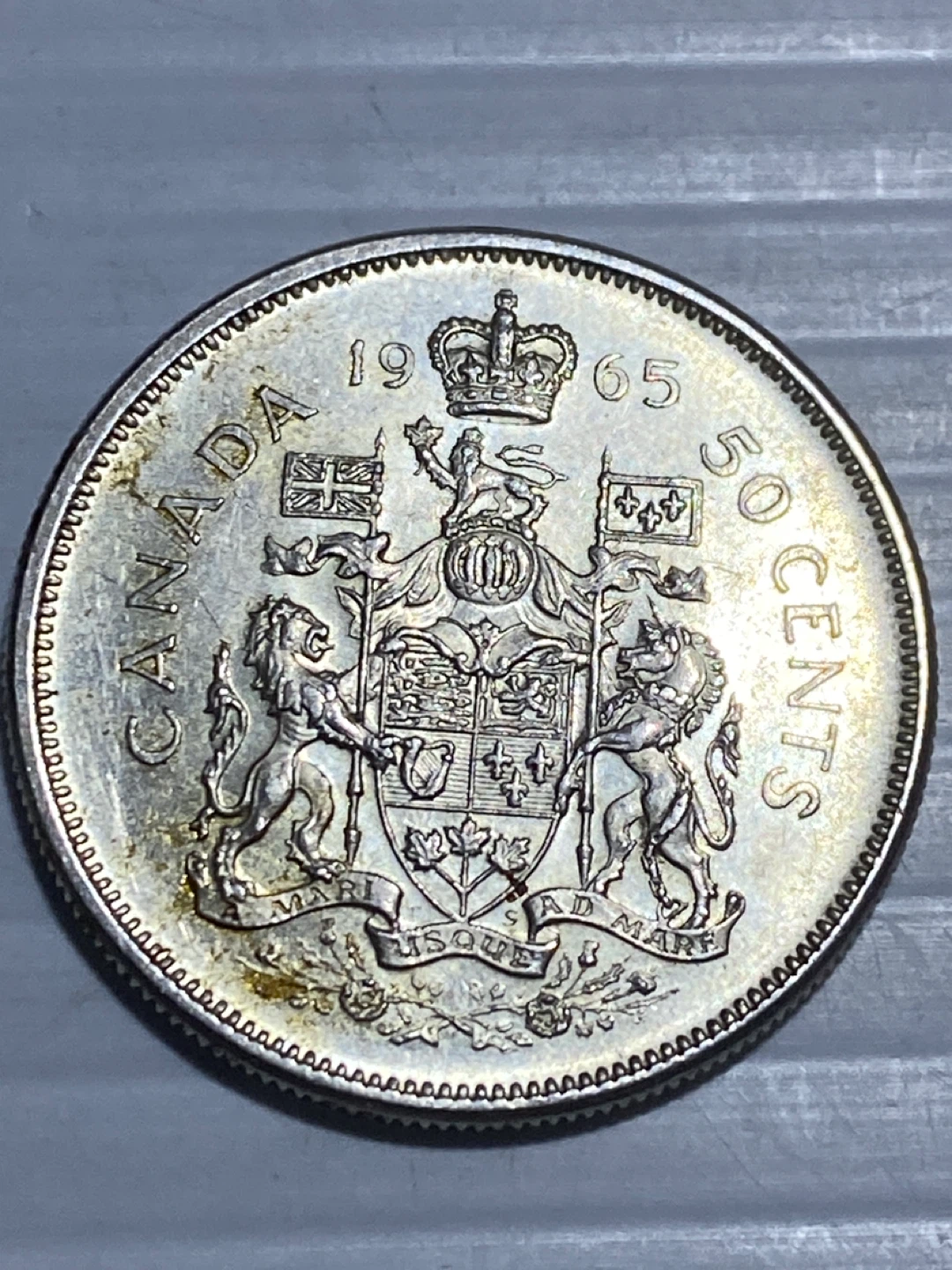 1965 silver Canadian 50 Cent Coin