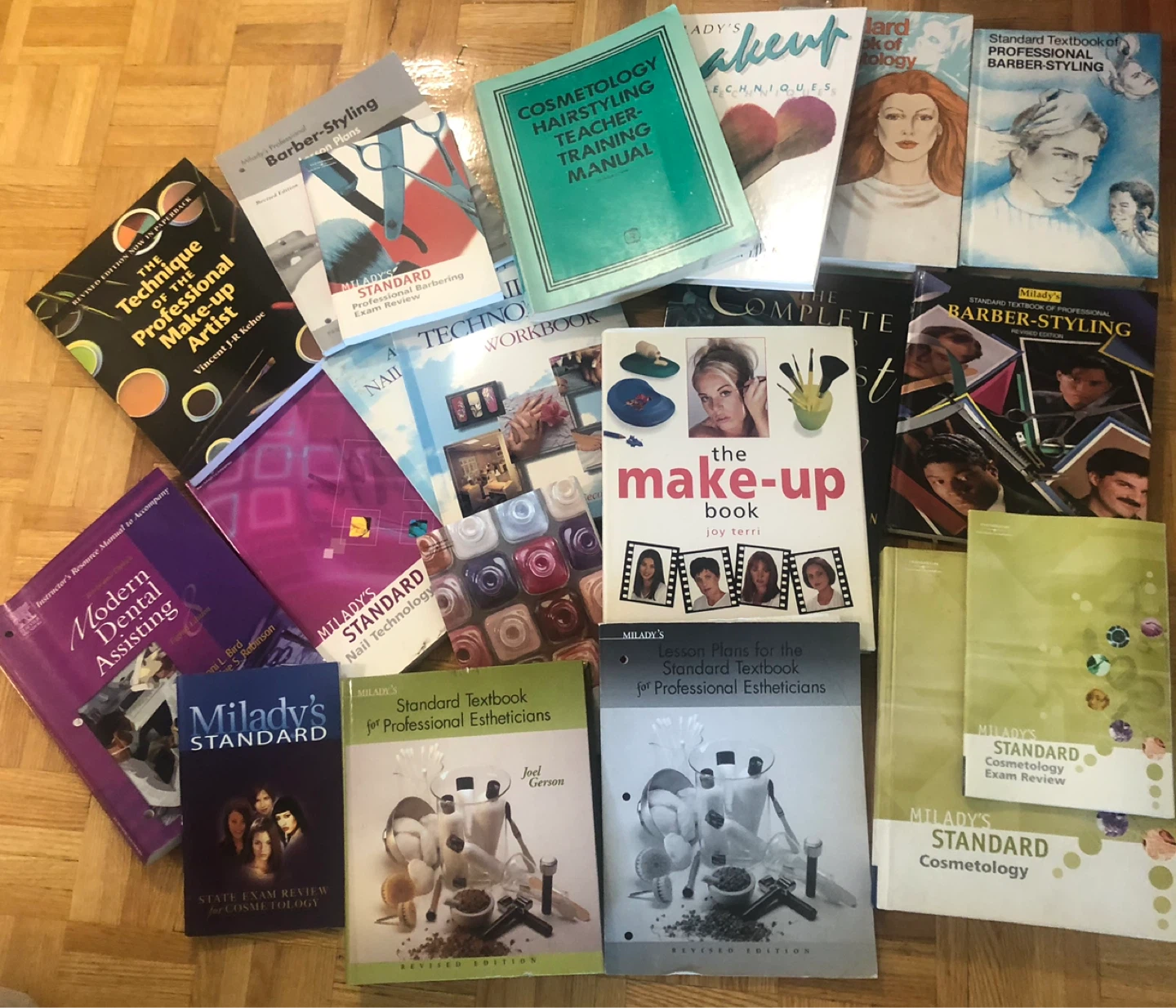 Collection of Milady's Cosmetology and Barbering Textbooks