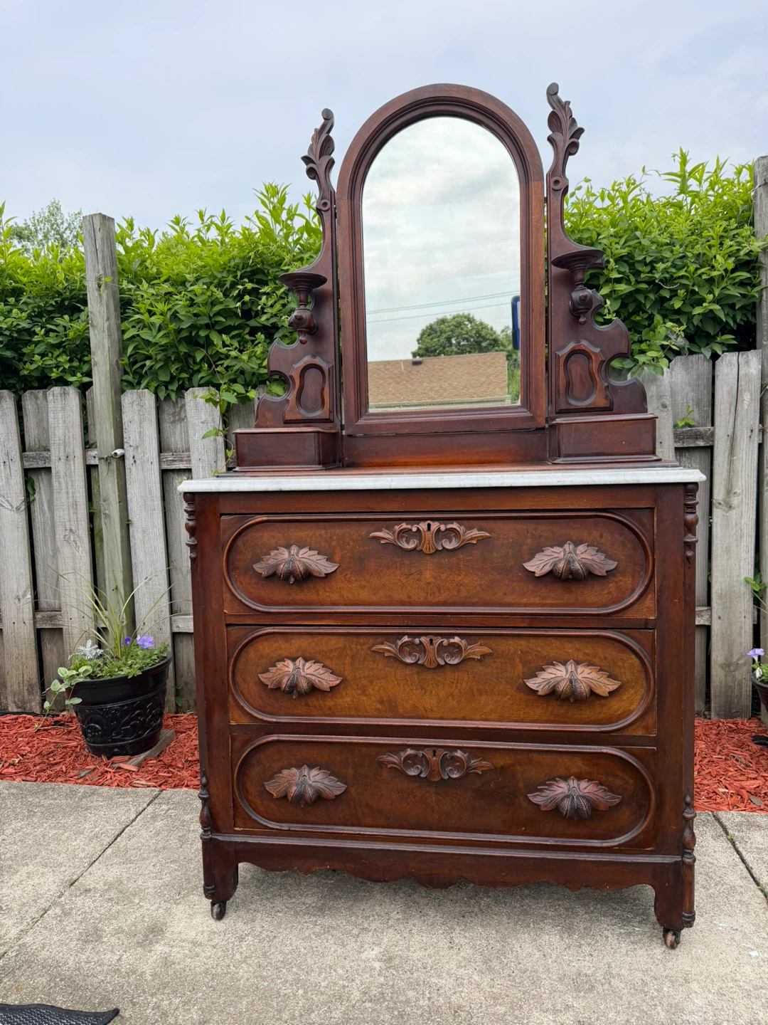 Antique Wooden Dresser with Mirror rolls on casters