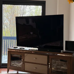 Sony Bravia Flat Screen TV + the wooden shelf under it