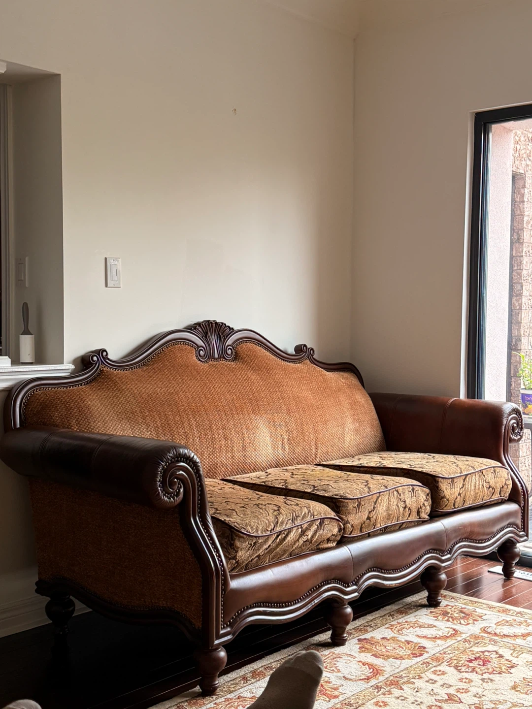 Vintage Sofa with Ornate Wood Trim