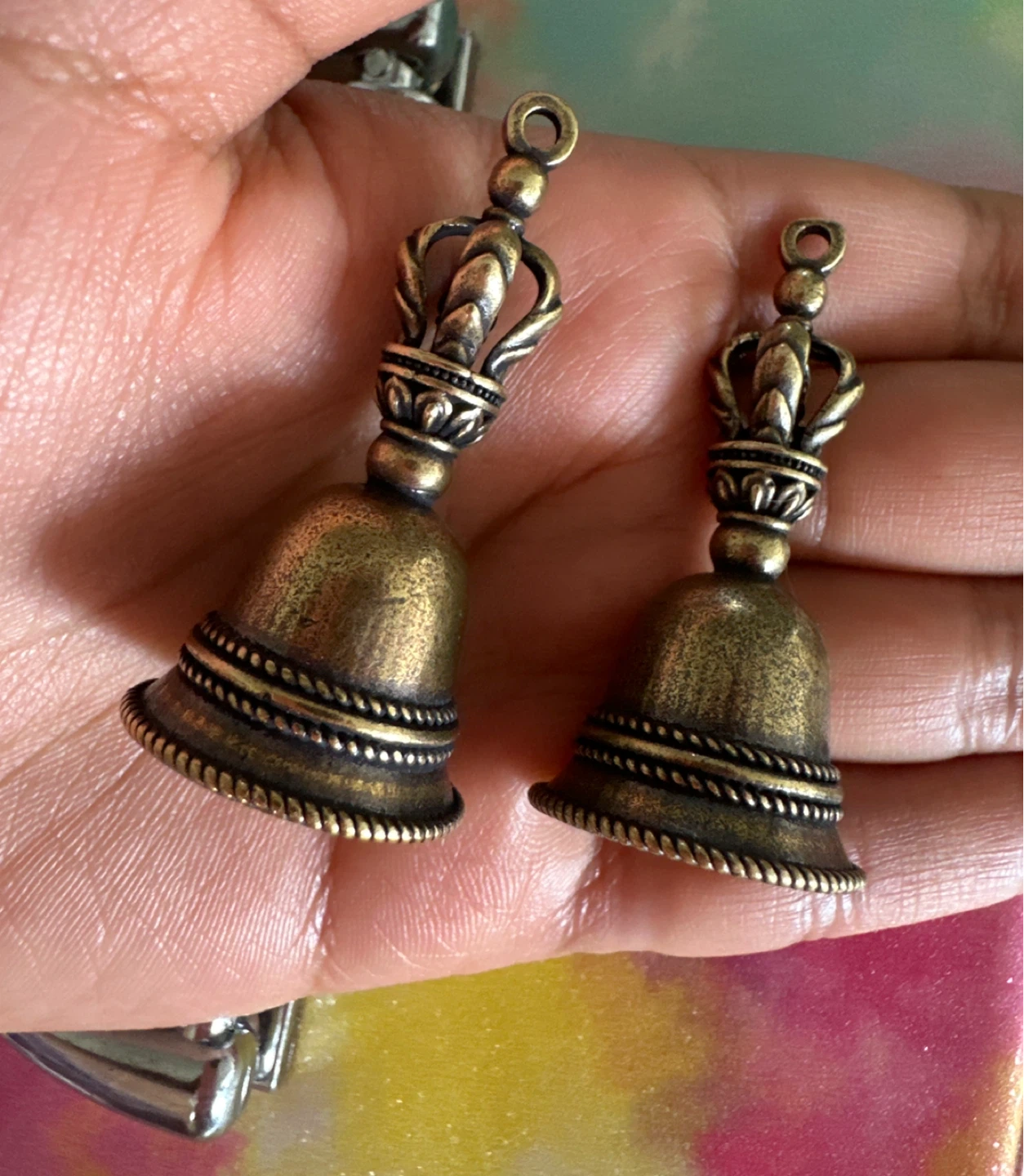 Two antique-style brass bells