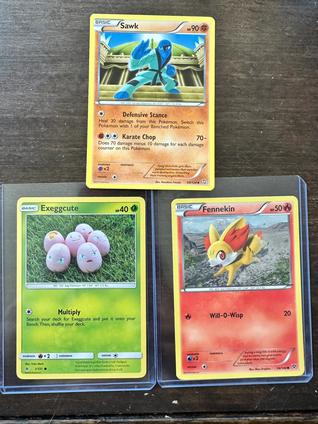 Lot of 3 Pokemon Cards - Sawk, Exeggcute, Fennekin