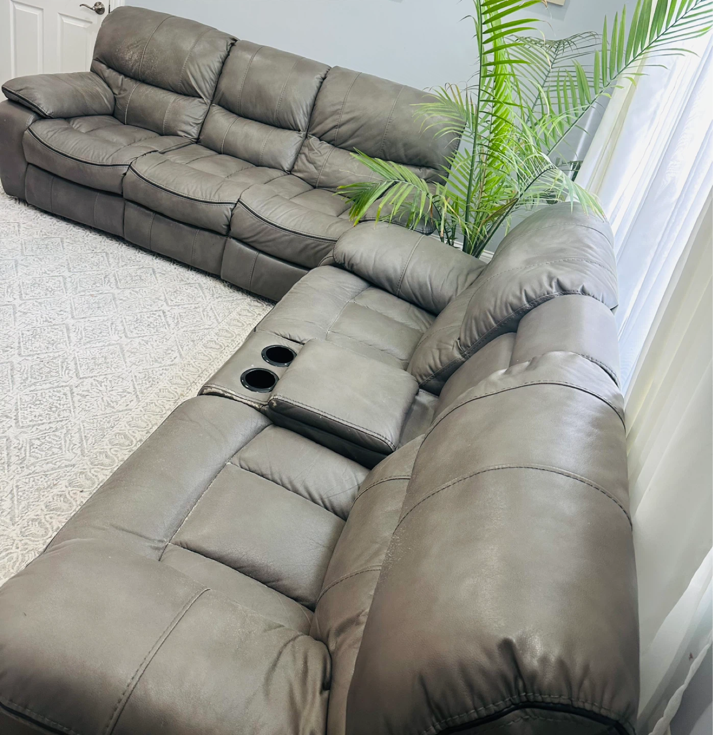 Gray Leather Reclining Sofa and Loveseat Set