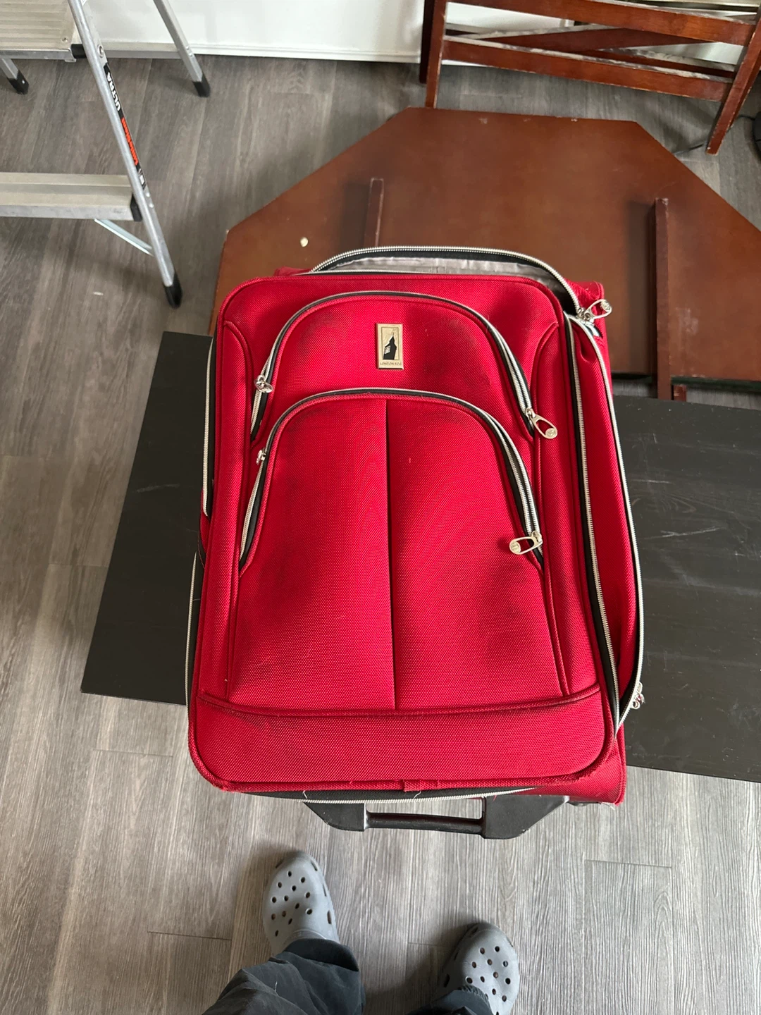 Skyway Red Rolling Suitcase