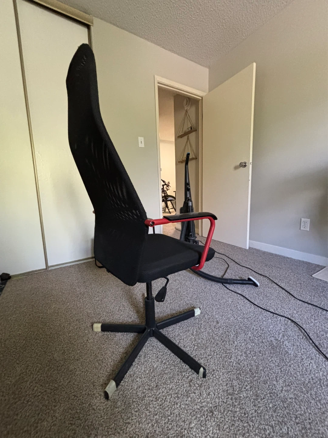 Black Mesh Office Chair with Red Accents