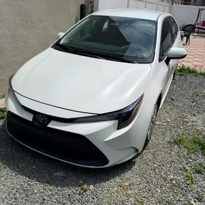 2024White Toyota Corolla LE Sedan clean title