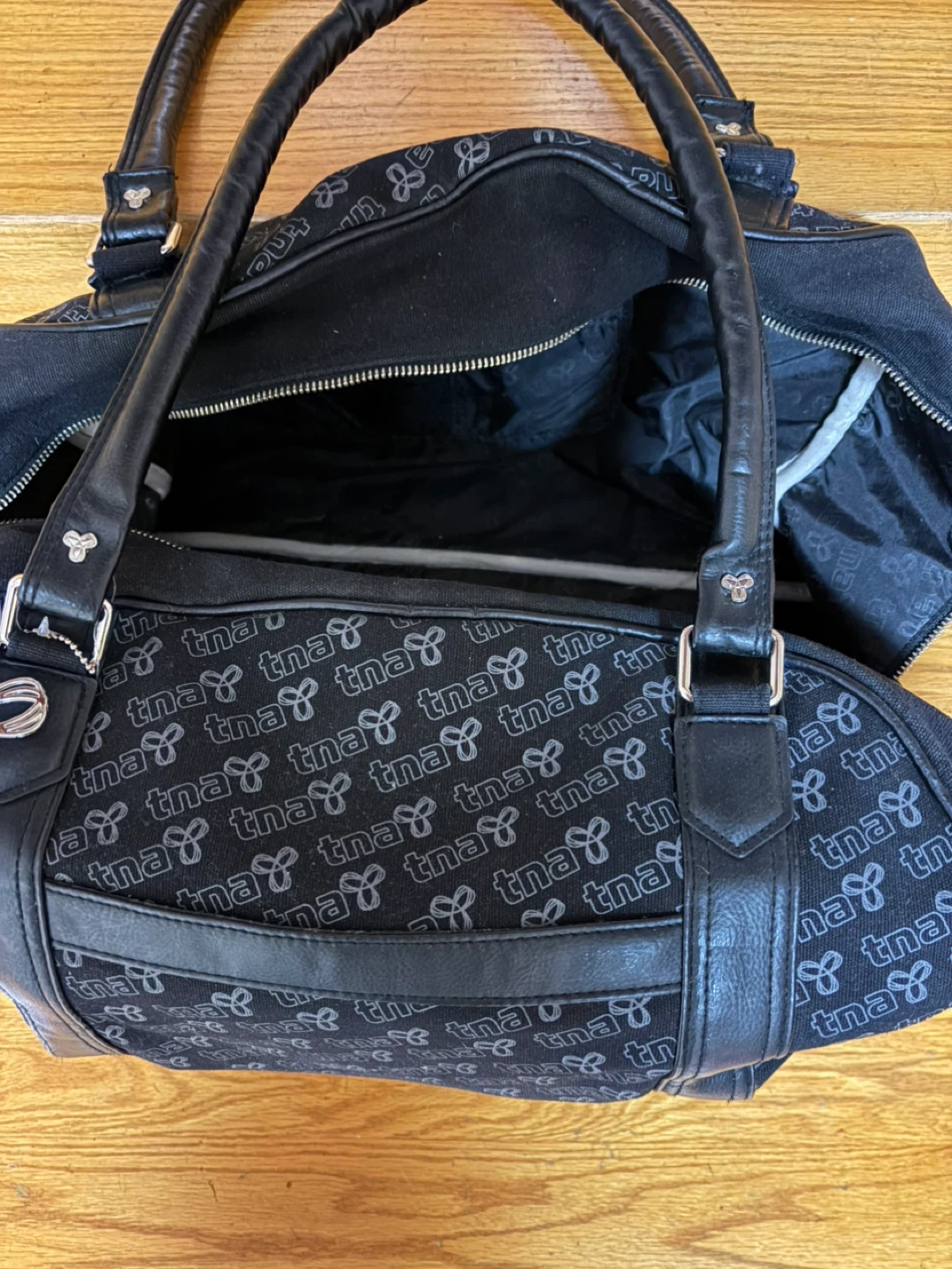 TNA Black Monogrammed Duffle Bag