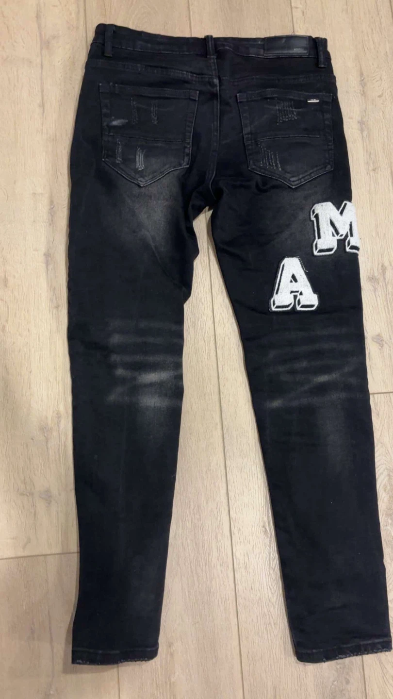 AMIRI Black Distressed Patch Logo Jeans - photo 2