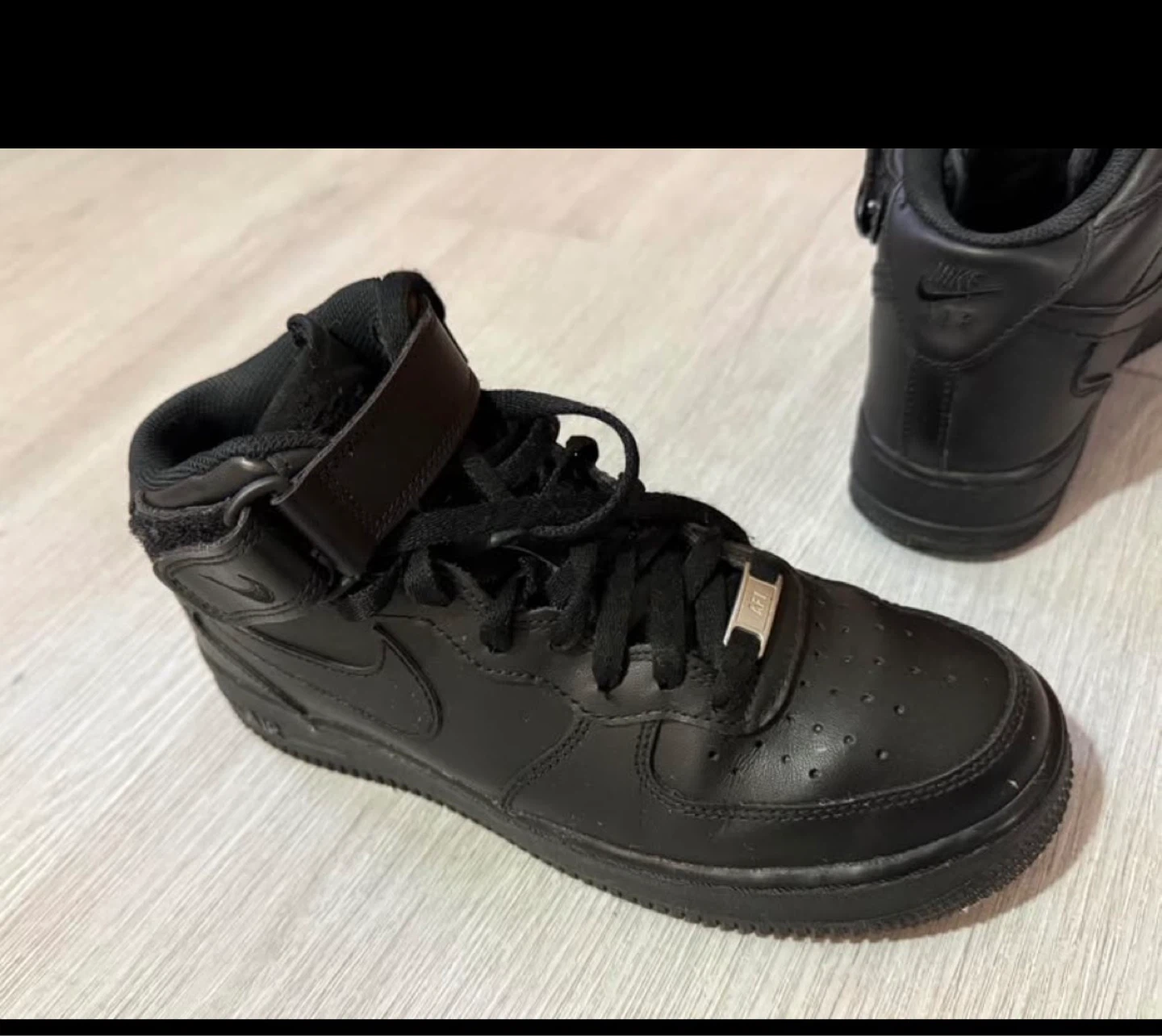 Nike Air Force 1 Mid Black Leather Sneakers