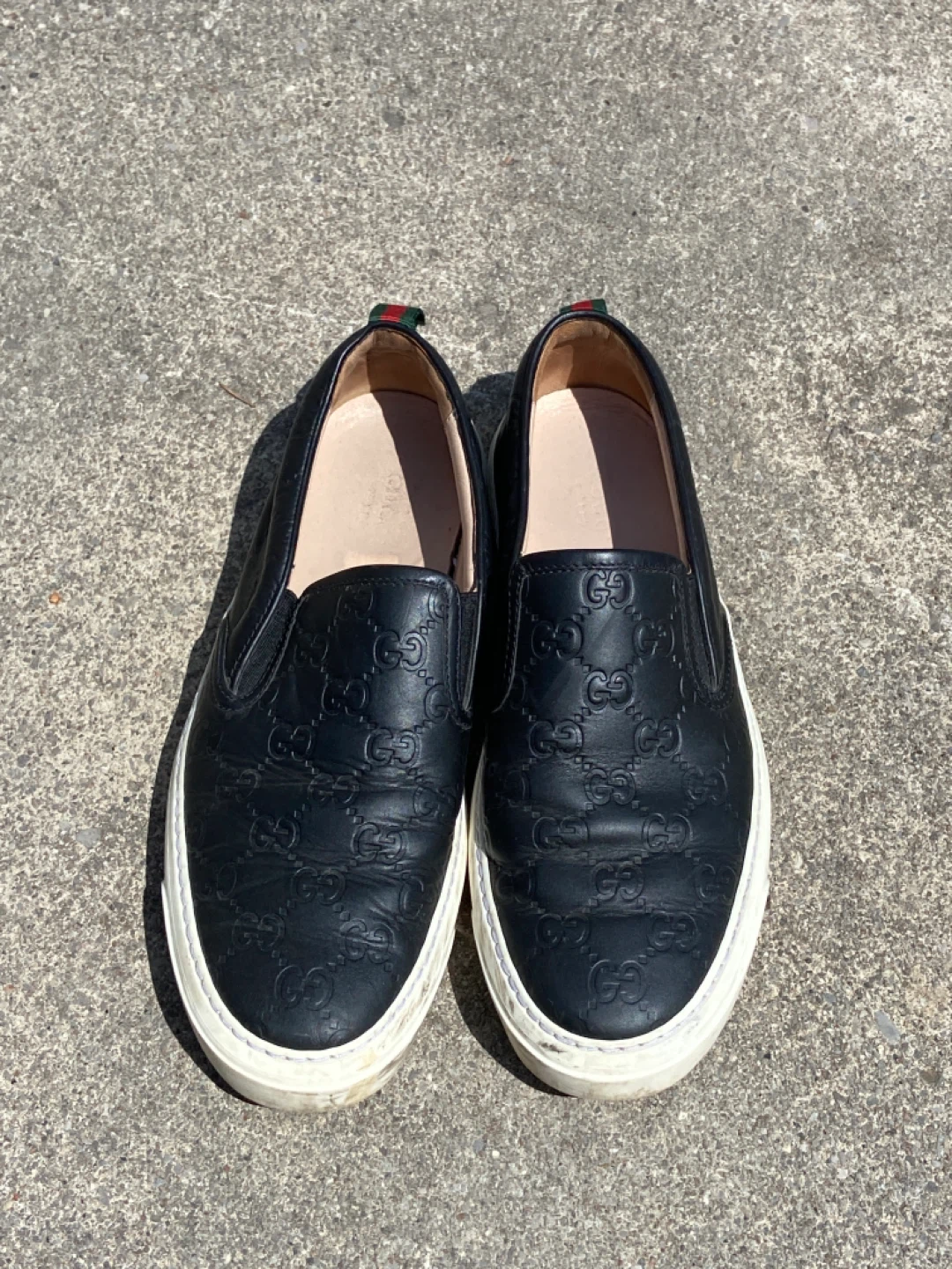 Gucci Black Embossed GG Slip-On Sneakers