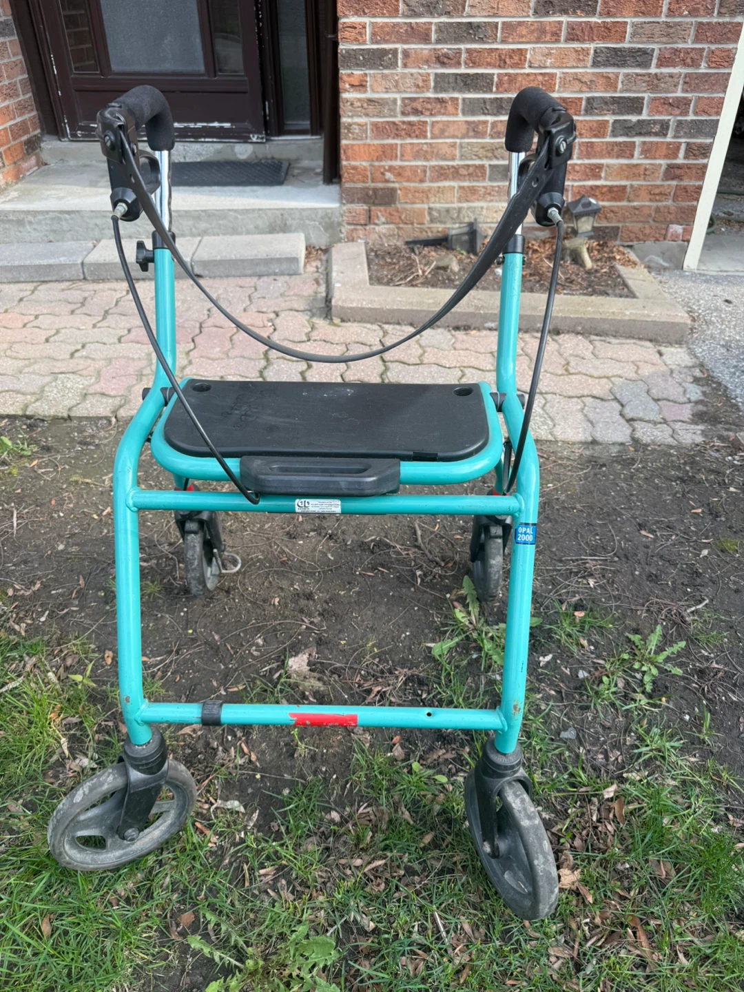 Teal 4-Wheel Walker with Seat and Brakes