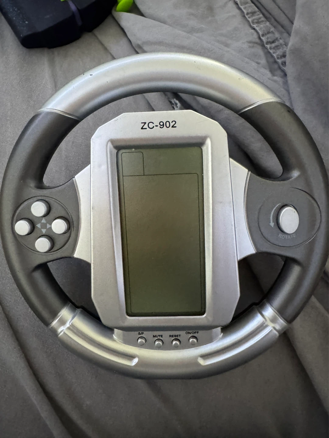 Handheld Electronic Driving Game –(Steering Wheel StyleGame)