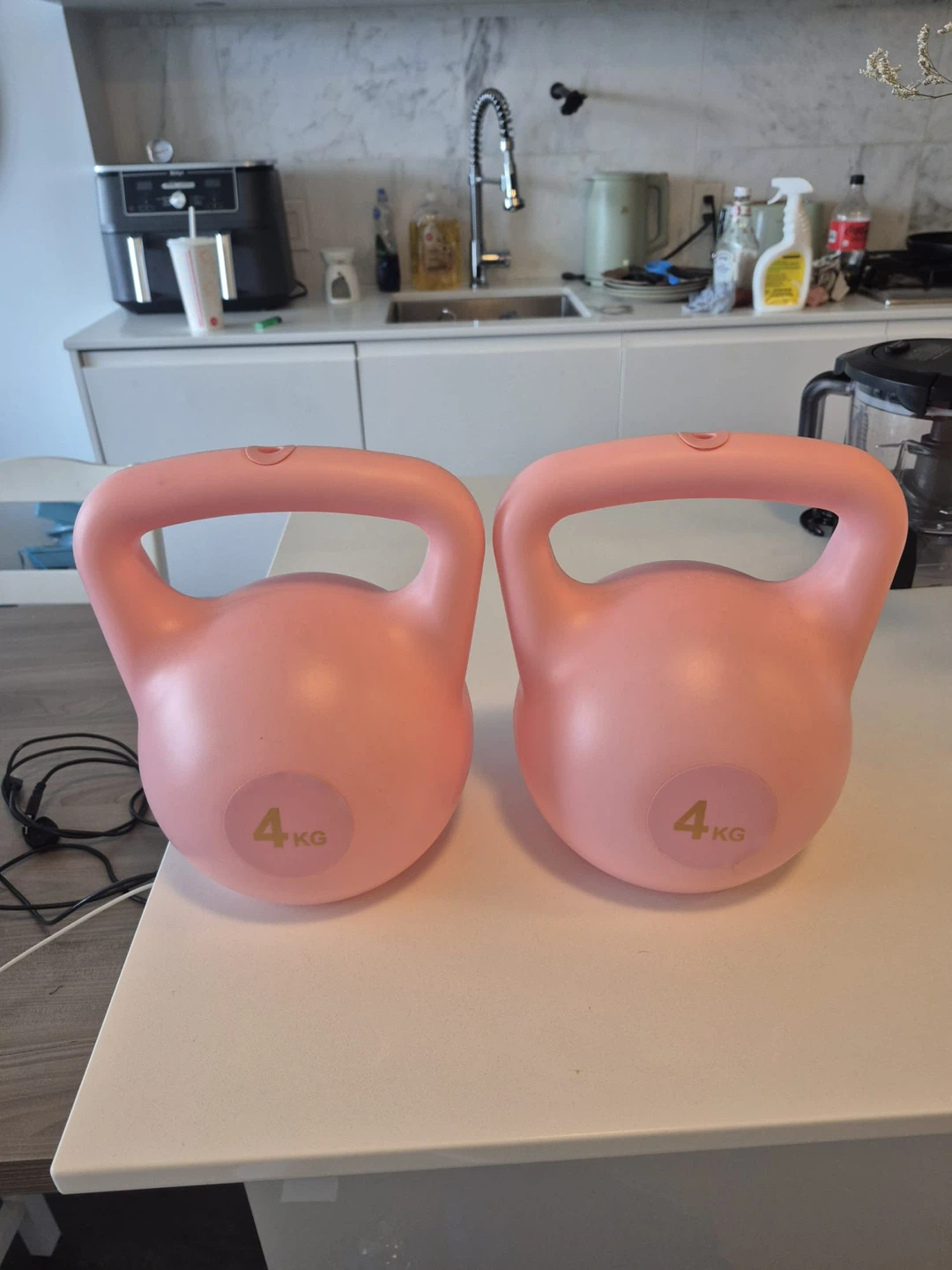 Two Pink 4KG Kettlebells