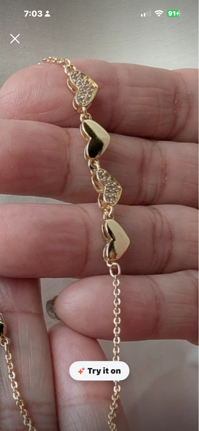 Gold laminated Bracelet with Heart Charms