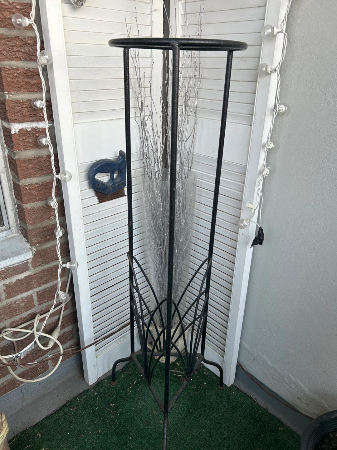 Black Metal Plant Stand with Decorative Base