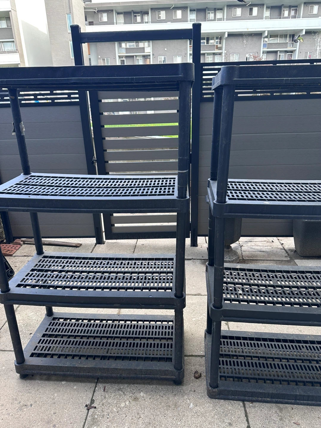Two Black 4-Tier Plastic Shelving Units - photo 2