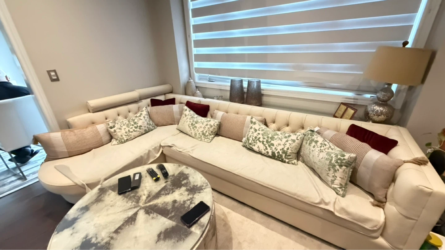 Cream Tufted Sectional Sofa with Pillows