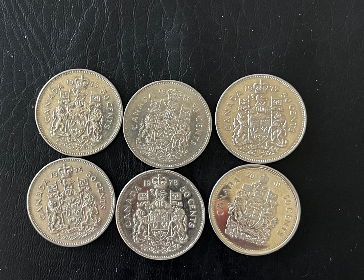 Military’s coat  of 6 Canadian 50 Cent Coins