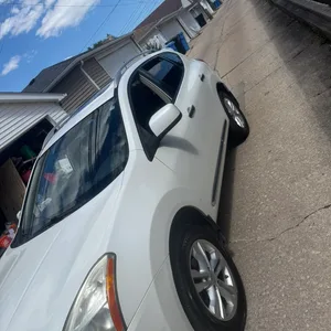 White Nissan Rogue SV AWD