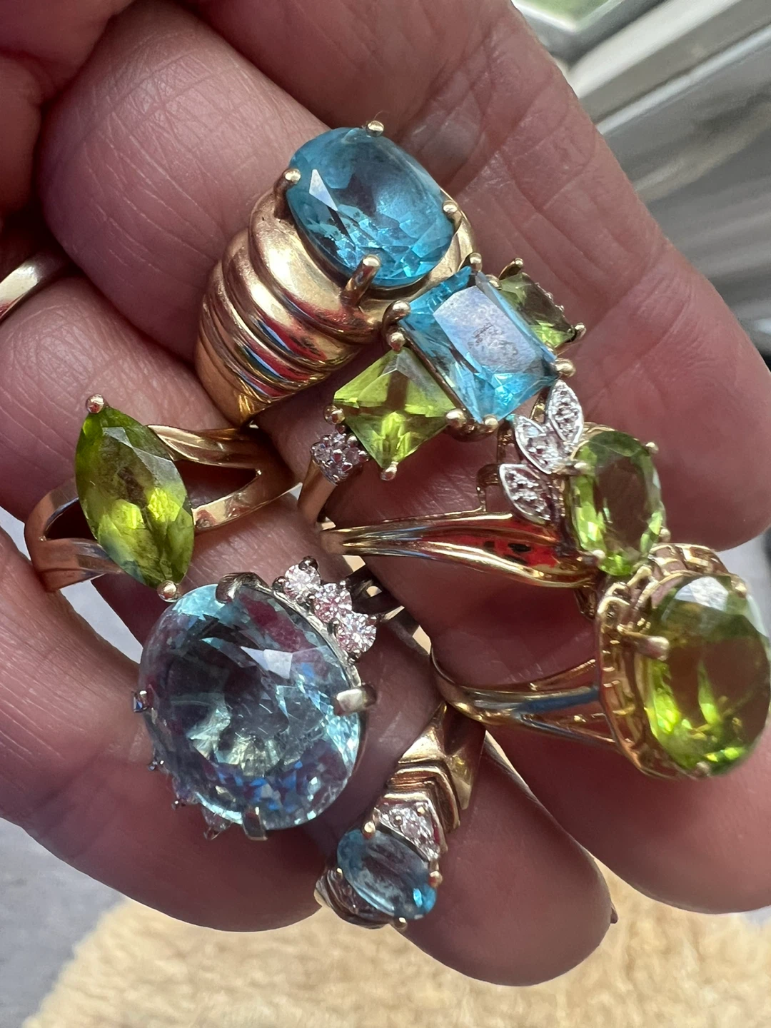 10k-14 k blue topaz and peridot rings