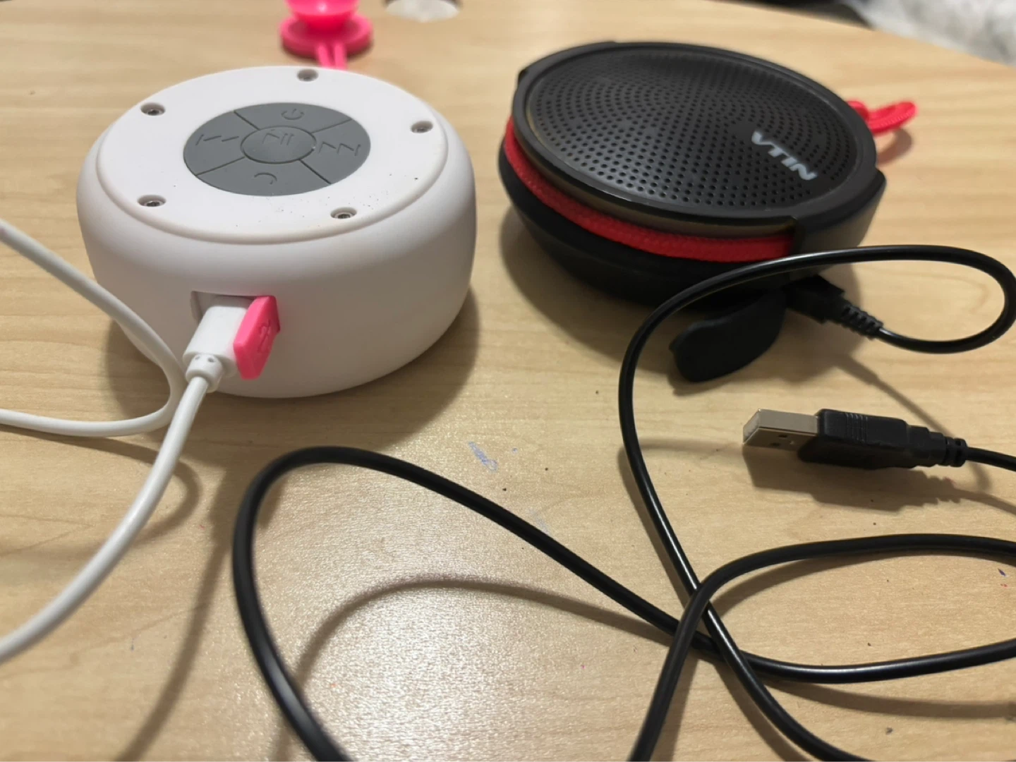 White & Black Portable Bluetooth Speakers with Charging Cables