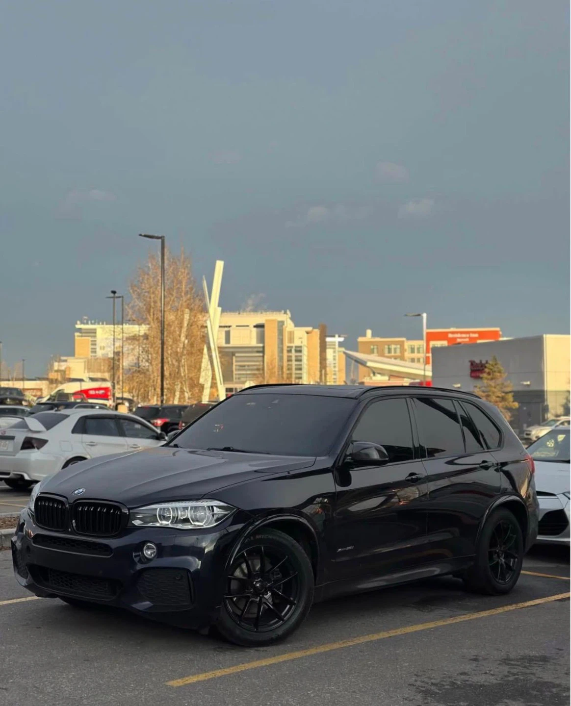 Black BMW X5 SUV - photo 2