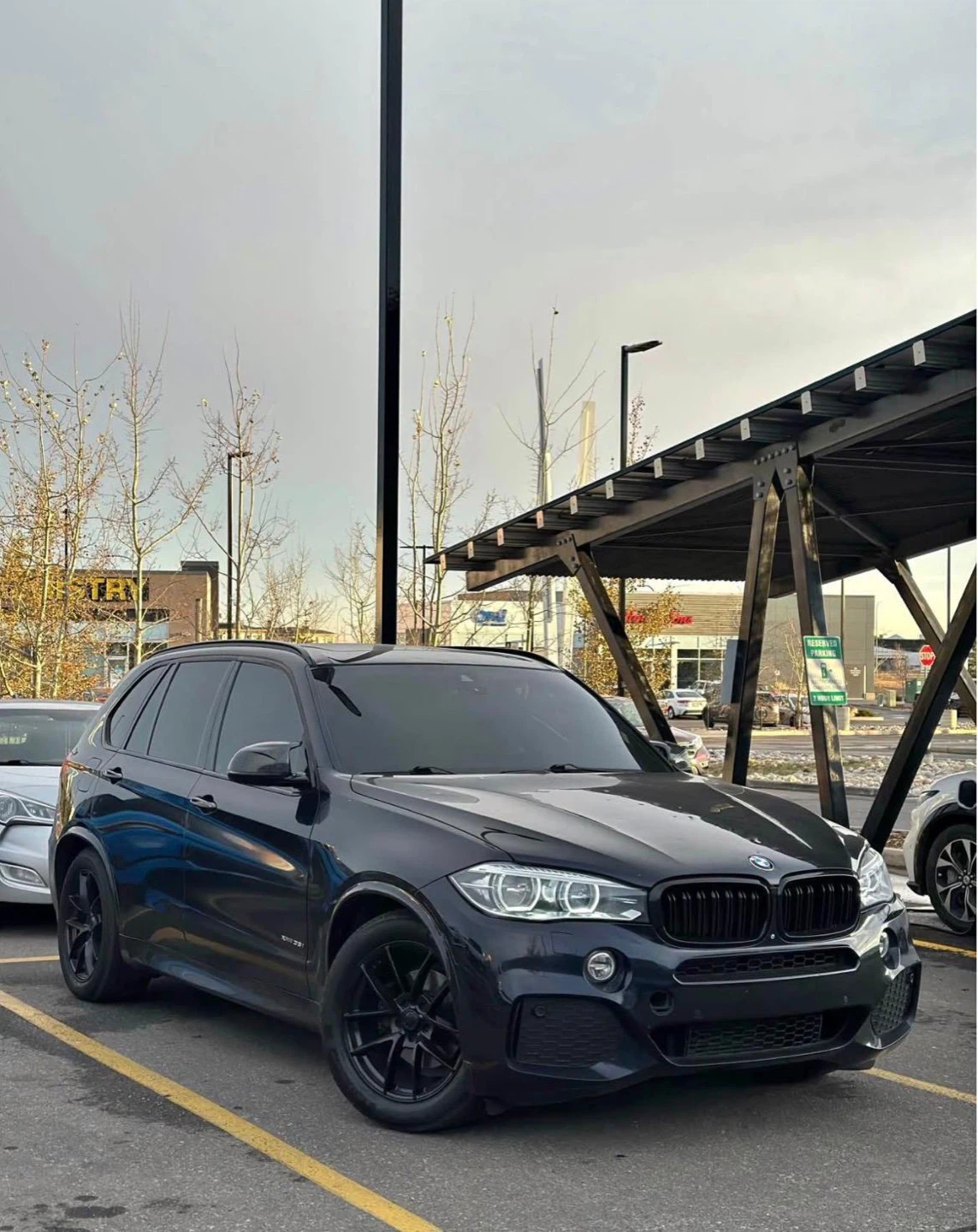 Black BMW X5 SUV - photo 3