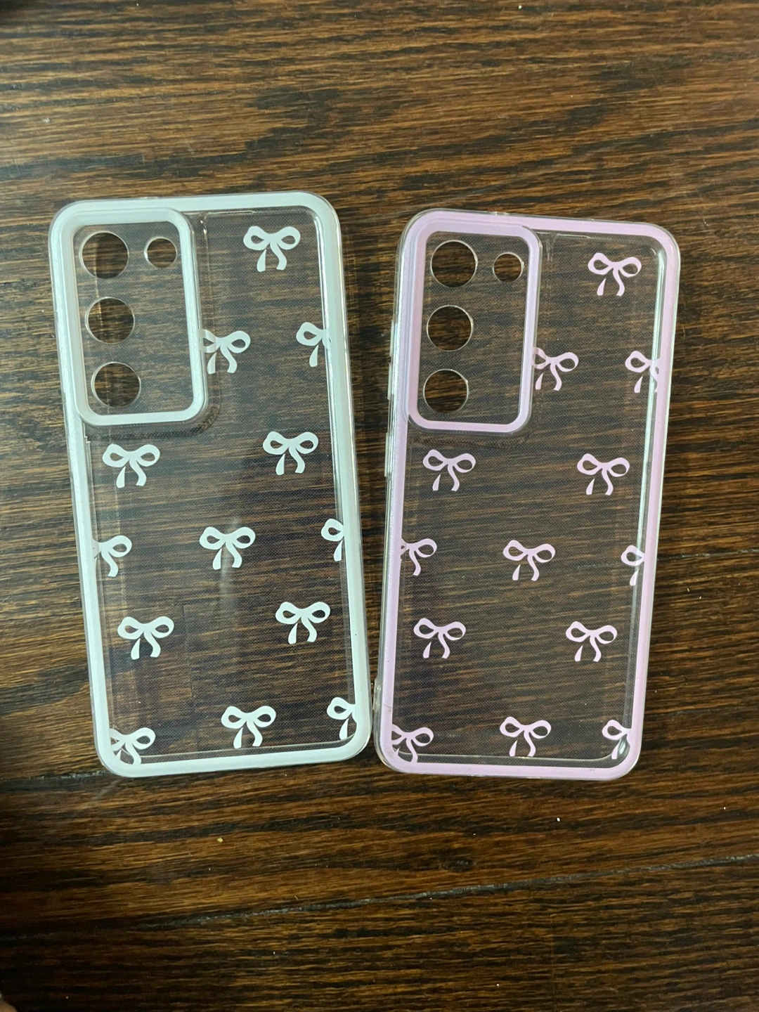 Samsung Galaxy S23 phone cases with white and pink bows